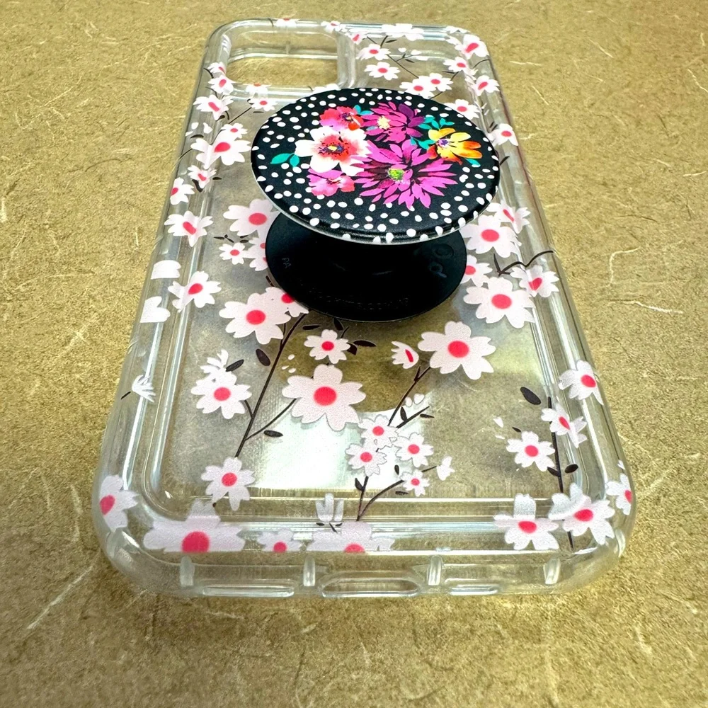 iPhone 12 Pro with pop socket.